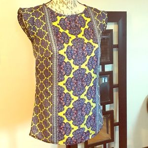 The limited-adorable polyester blouse in XS.